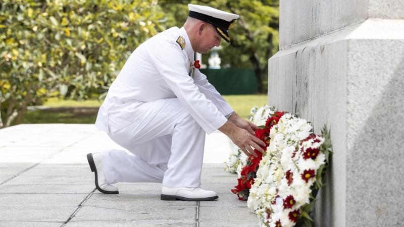Maritime Task Group Commander, Commodore Mal Wise, AM, RAN lays a wreath during the Remembrance Day Ceremony at the Cenotaph War Memorial Park in Singapore.