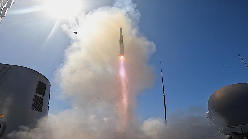 Royal Australian Navy frigate HMAS Toowoomba fires an Evolved Sea Sparrow Missile.