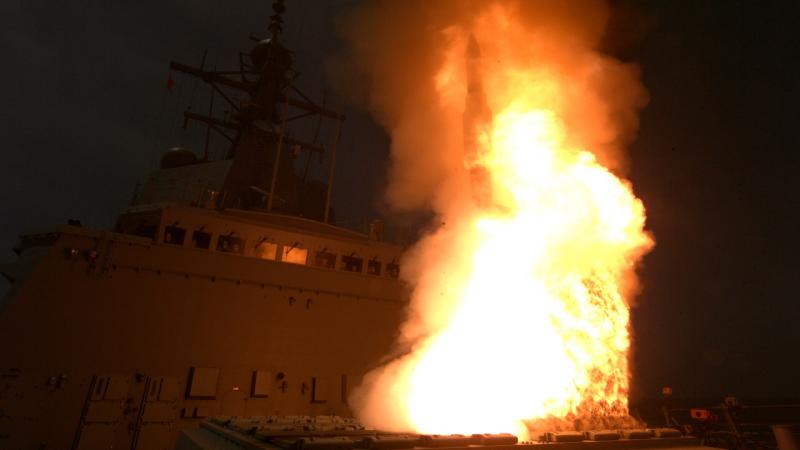HMAS Sydney fires a SM-2 Standard missile.