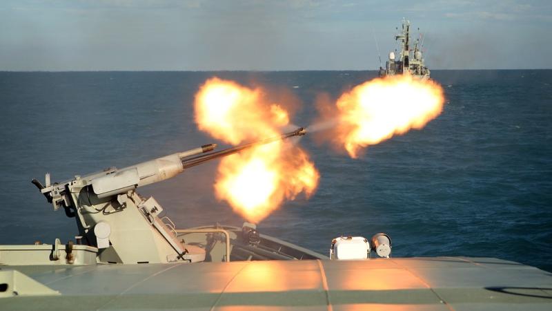 HMAS Glenelg conducts a 25mm anti-aircraft firing serial.