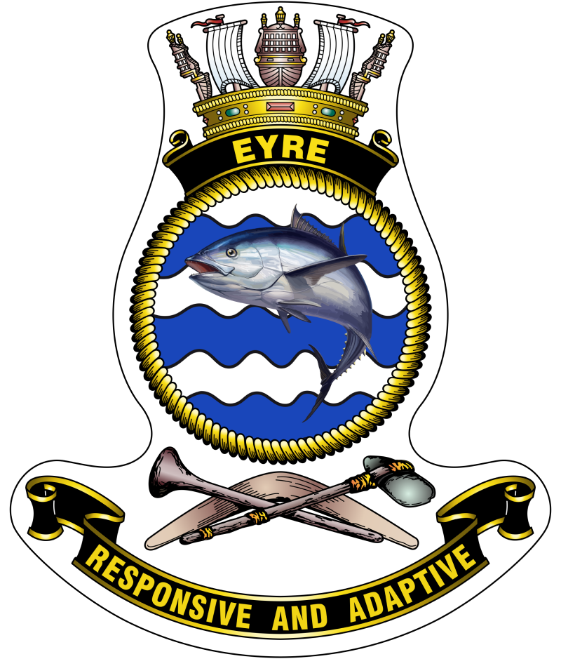 The official HMAS Eyre badge with blue and white waves and and a fish.